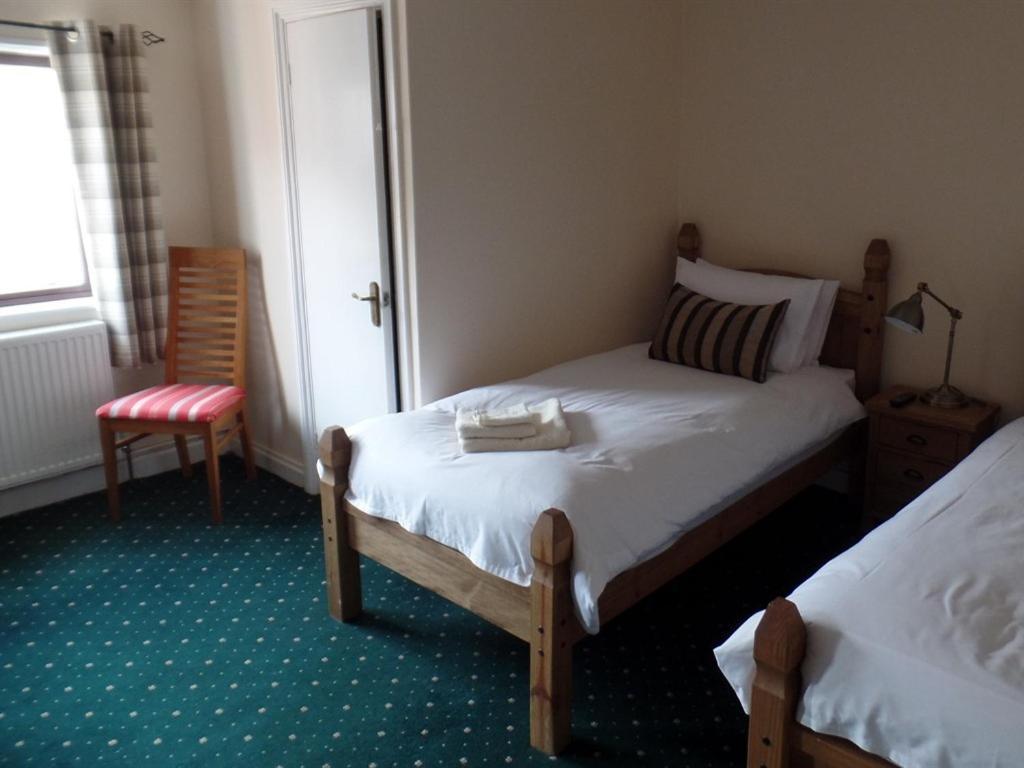 Royal George Hotel Great Easton  Szoba fotó